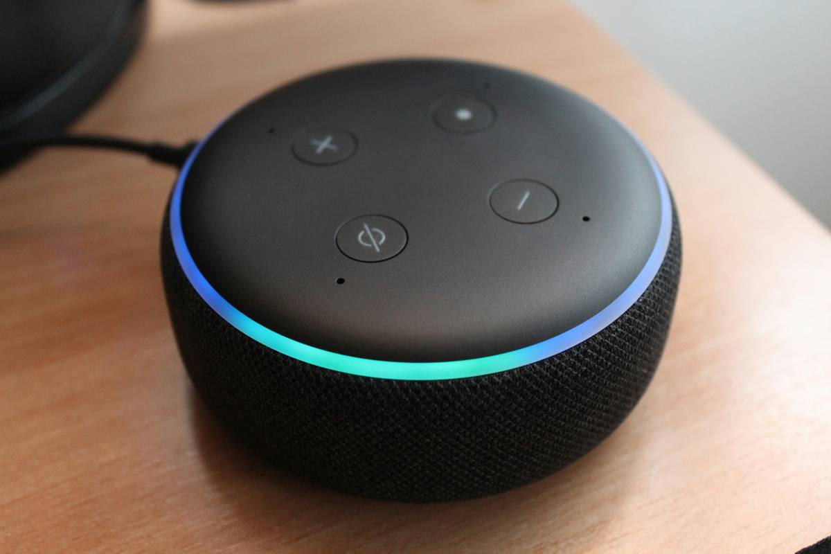 Diagram showing how smart home speakers connect to lights, thermostats, cameras, and music services